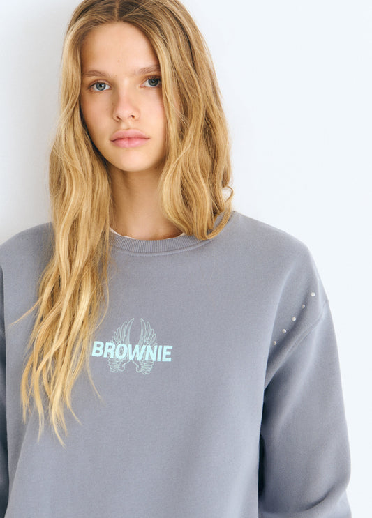 Sudadera print alas glitter
