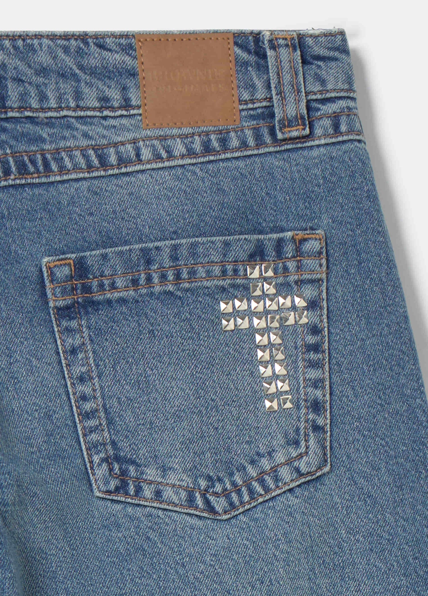 Jeans tachas cruz