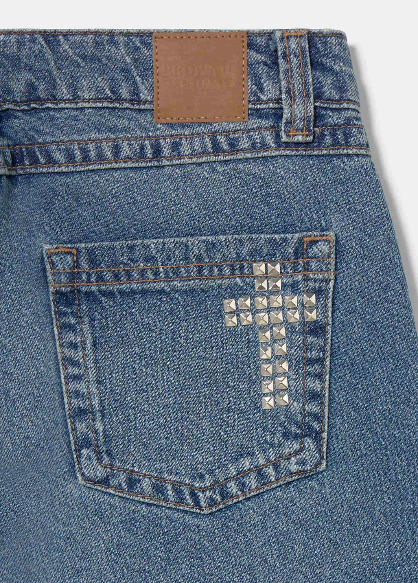 Jeans tachas cruz