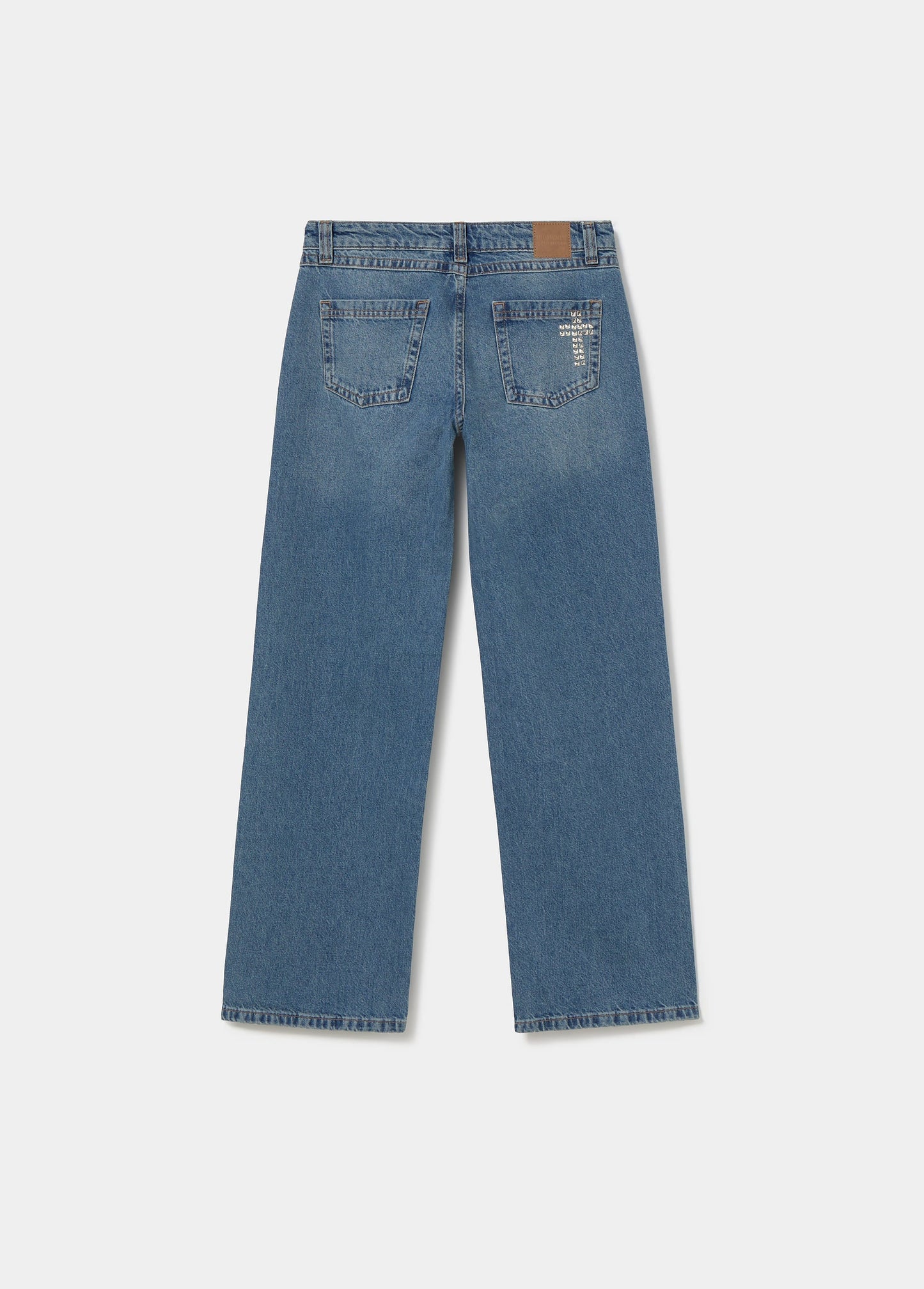 Jeans tachas cruz