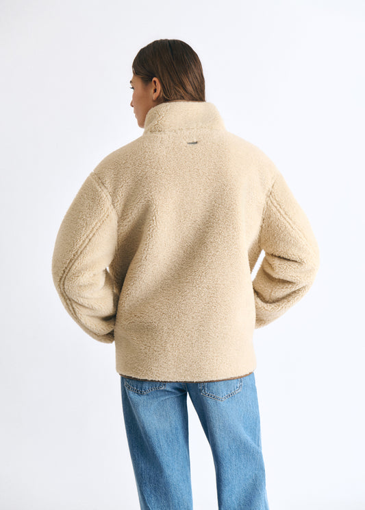 Abrigo reversible doble faz