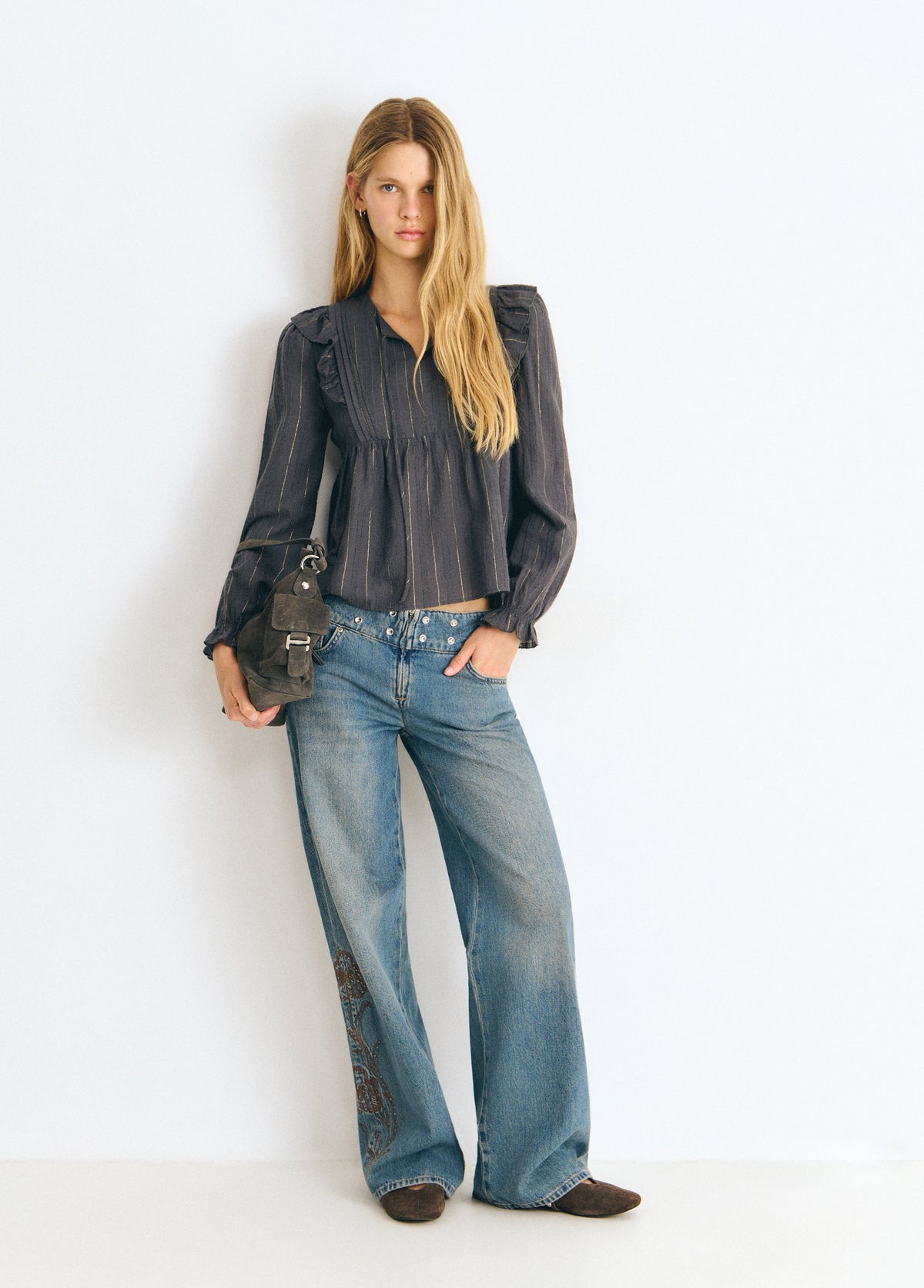 Blusa detalle volantes raya lurex