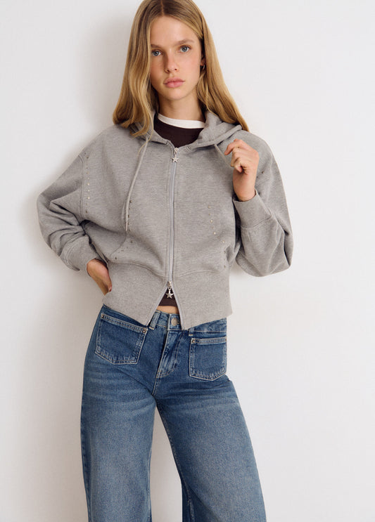 Jeans bolsillo frontal bordado