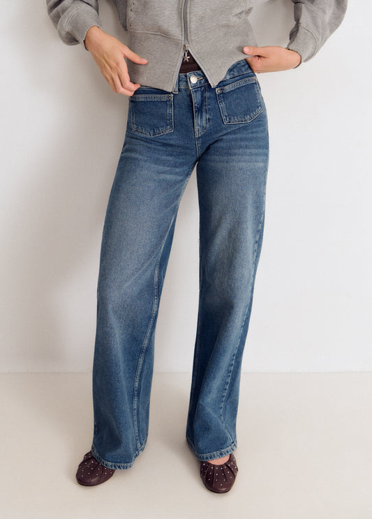 Jeans bolsillo frontal bordado