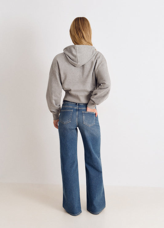 Jeans bolsillo frontal bordado