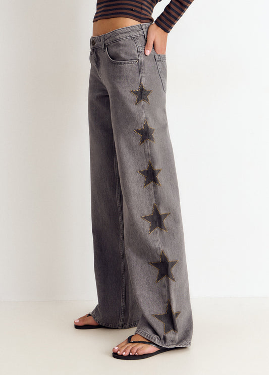 Jeans estrellas tachas lateral