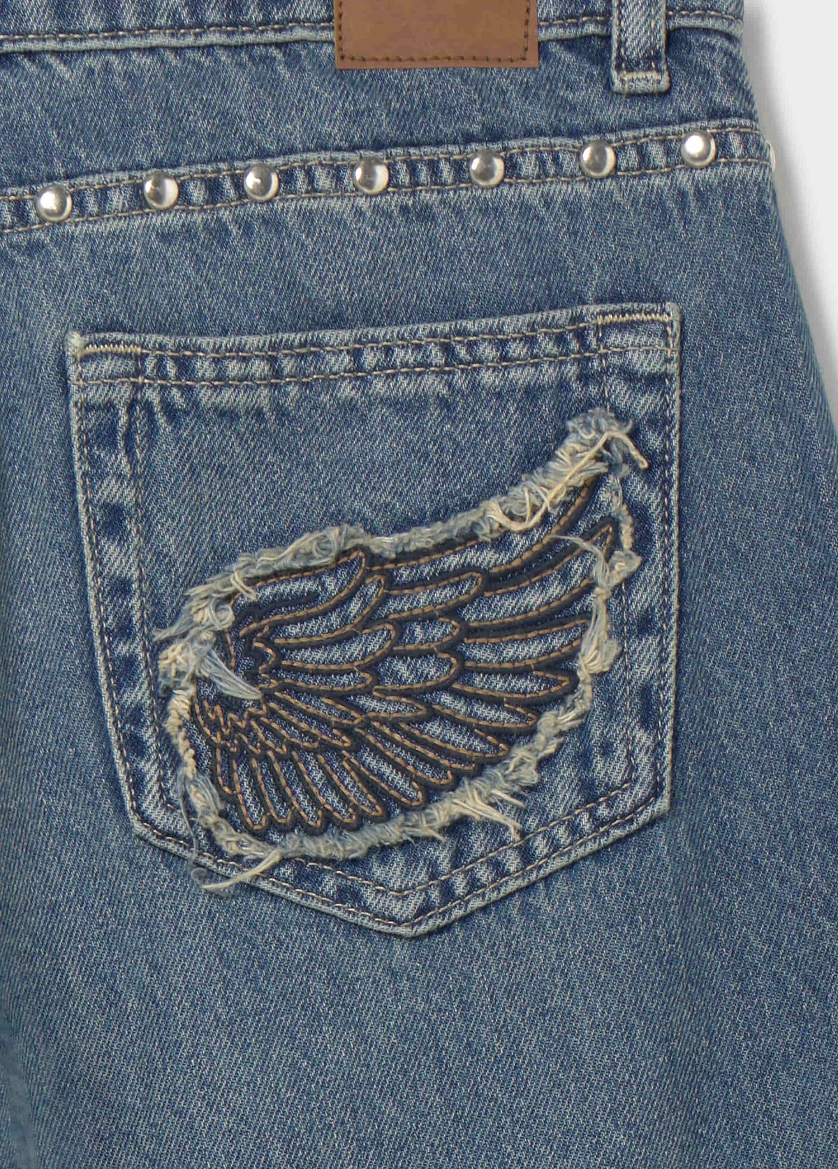 Jeans recto alas bordadas