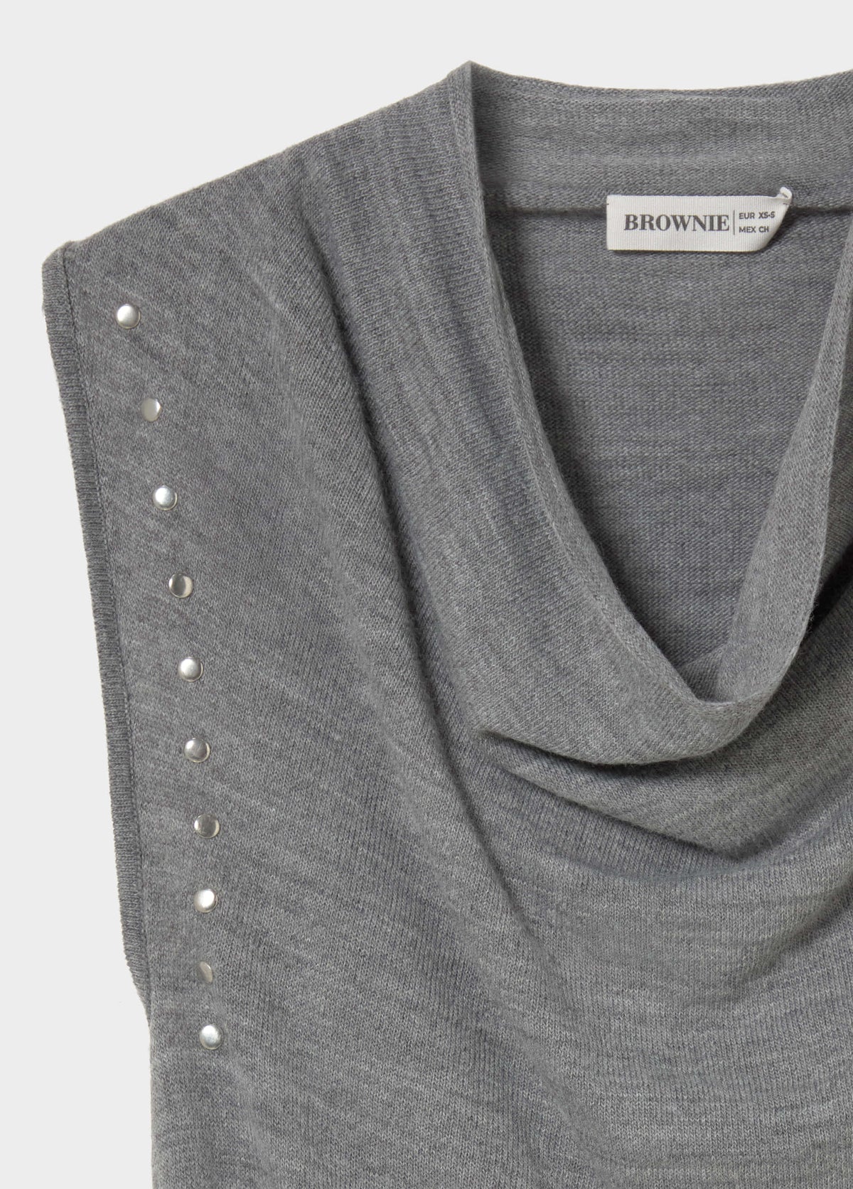 Top frunce tachas