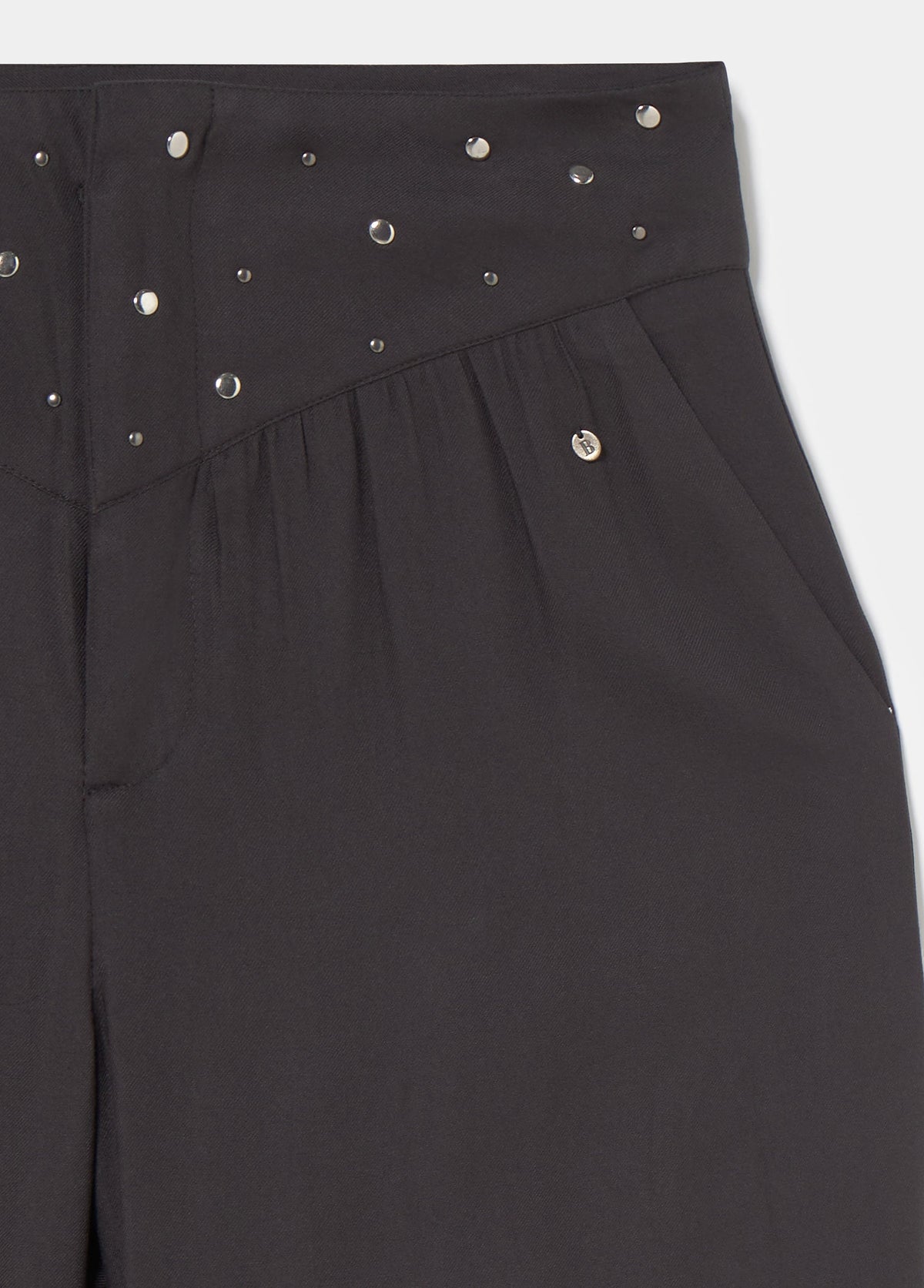 Pantalón bombacho cintura tachas