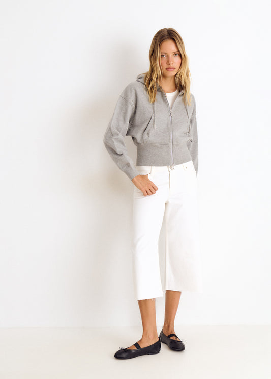 Sudadera capucha tachas