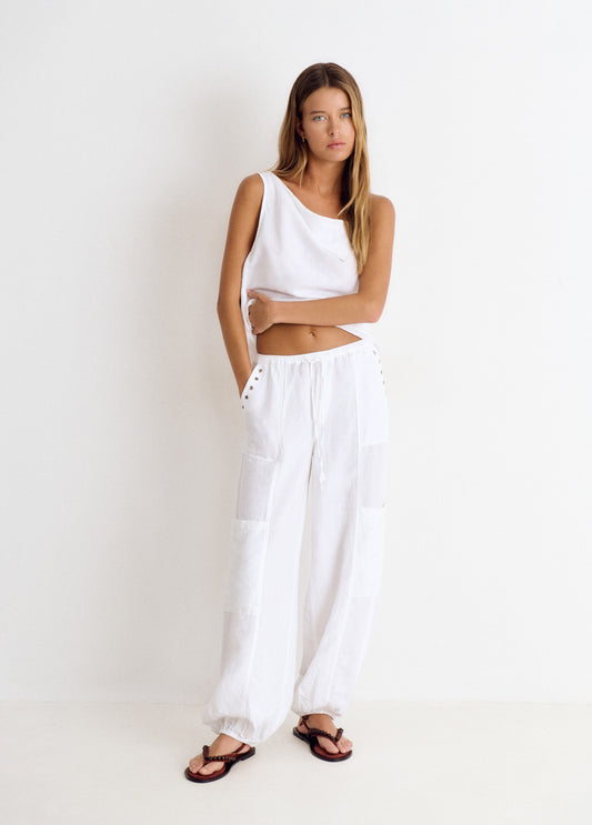 Pantalón bombacho lino detalle tachas