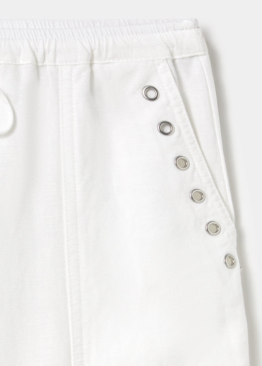 Pantalón bombacho lino detalle tachas
