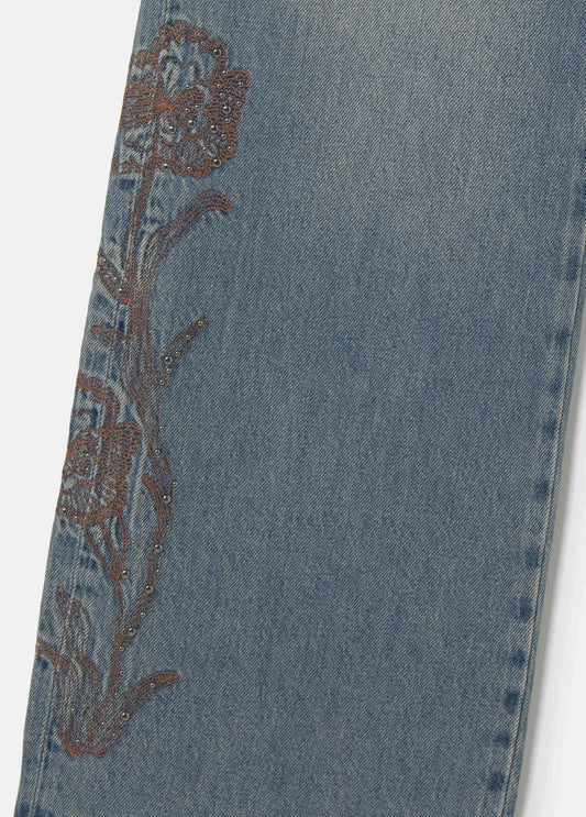Jeans cinturilla tachas y bordado
