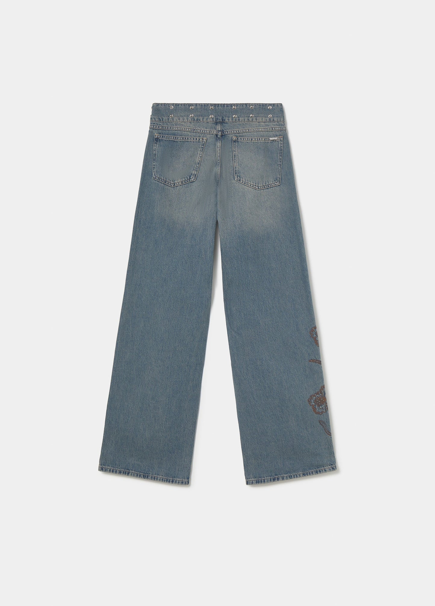 Jeans cinturilla tachas y bordado