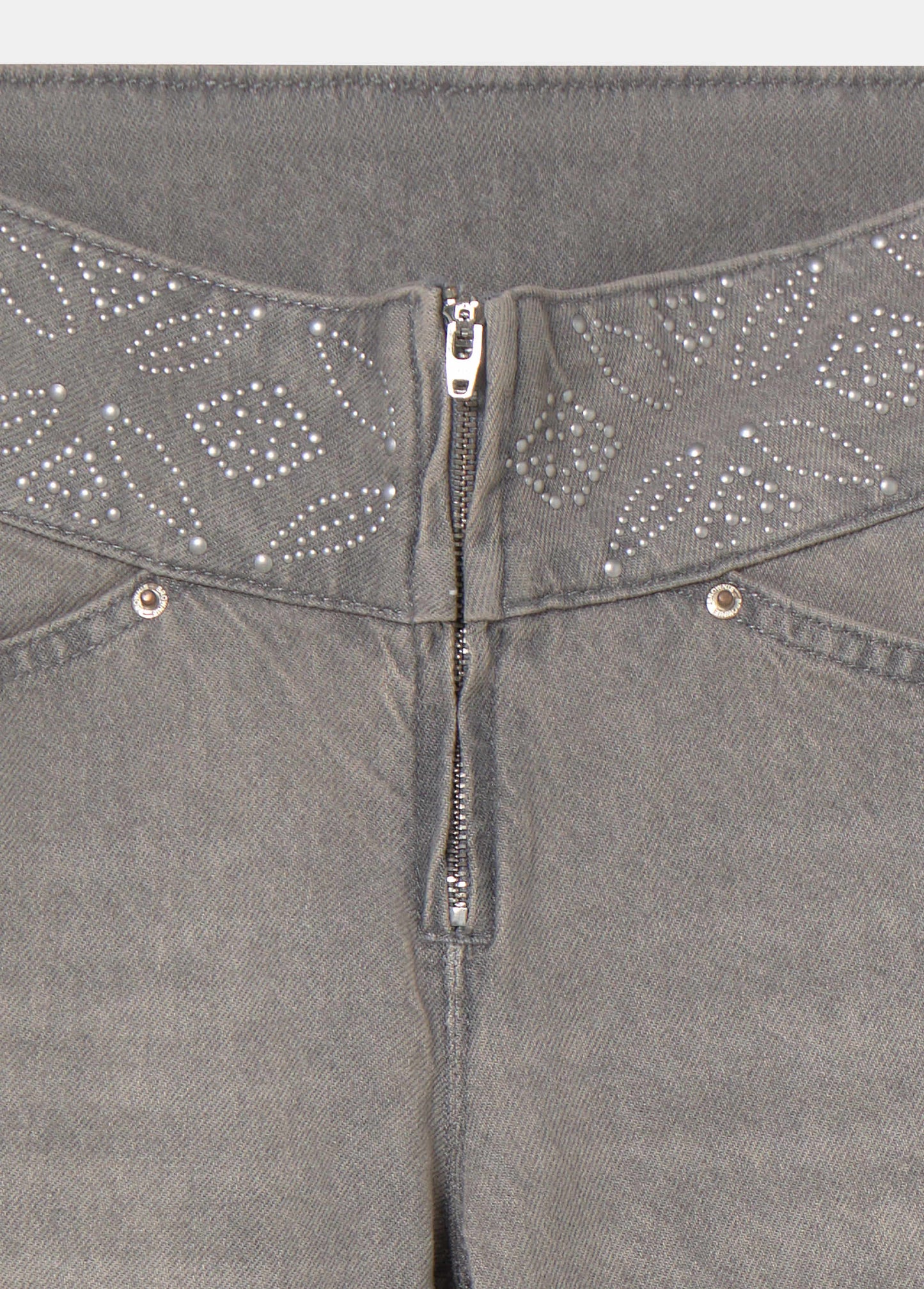 Jeans cinturilla ancha tachas