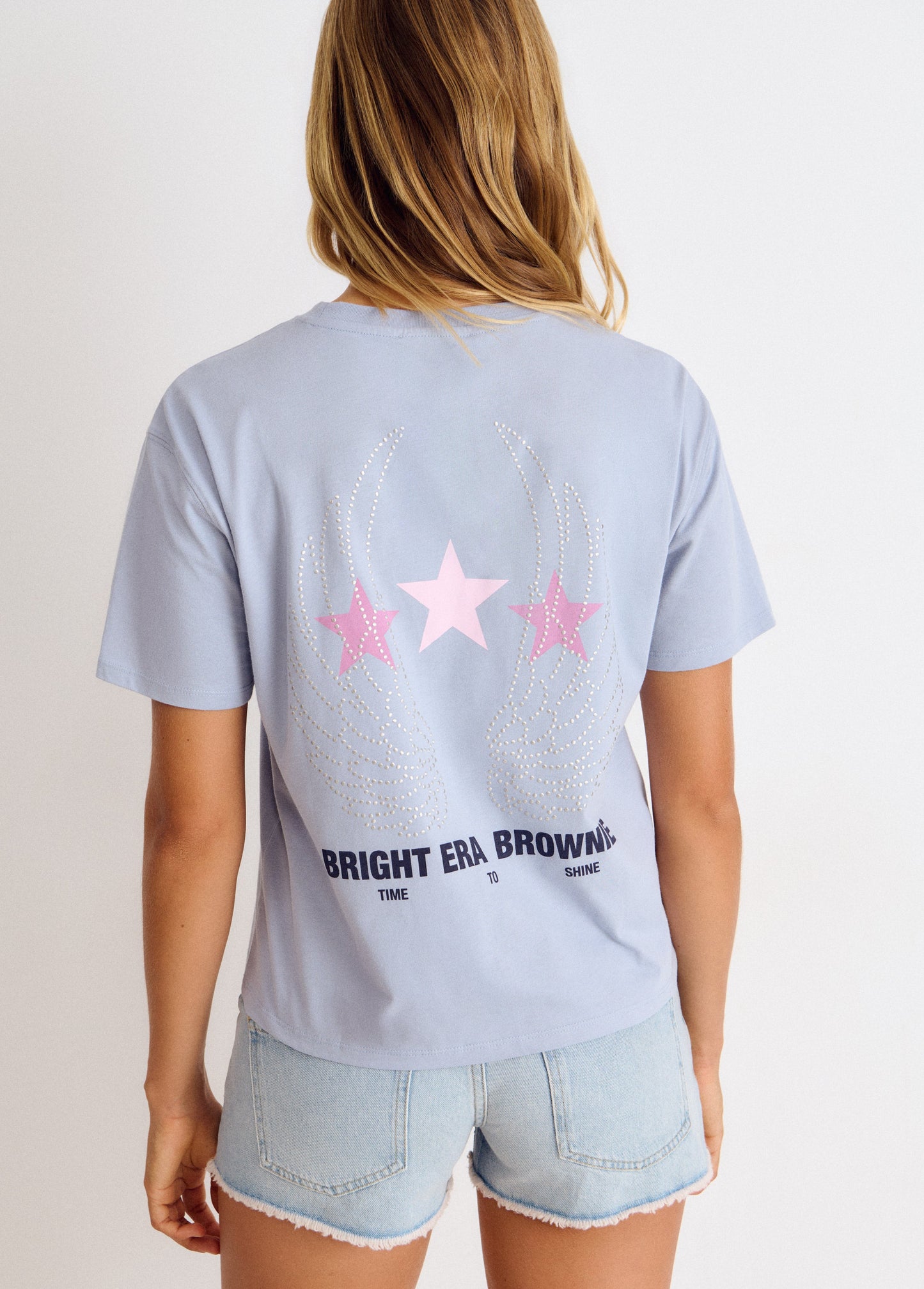 Camiseta alas tachas