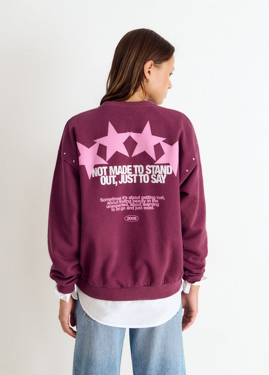 Sudadera print estrellas tachas