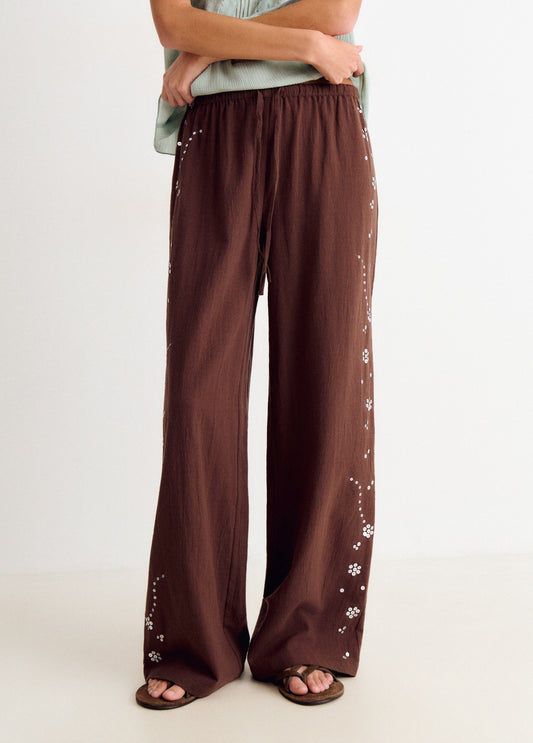 Pantalón fluido detalle lentejuelas lateral