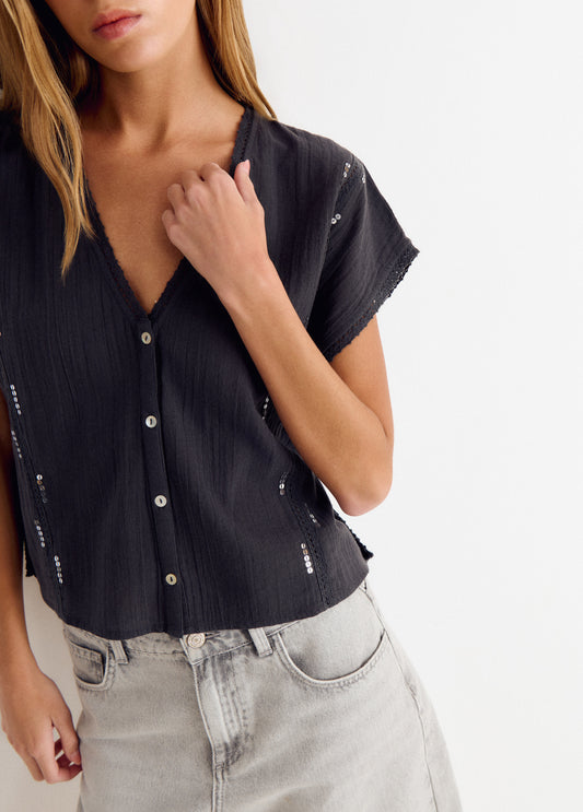 Blusa detalles lentejuelas