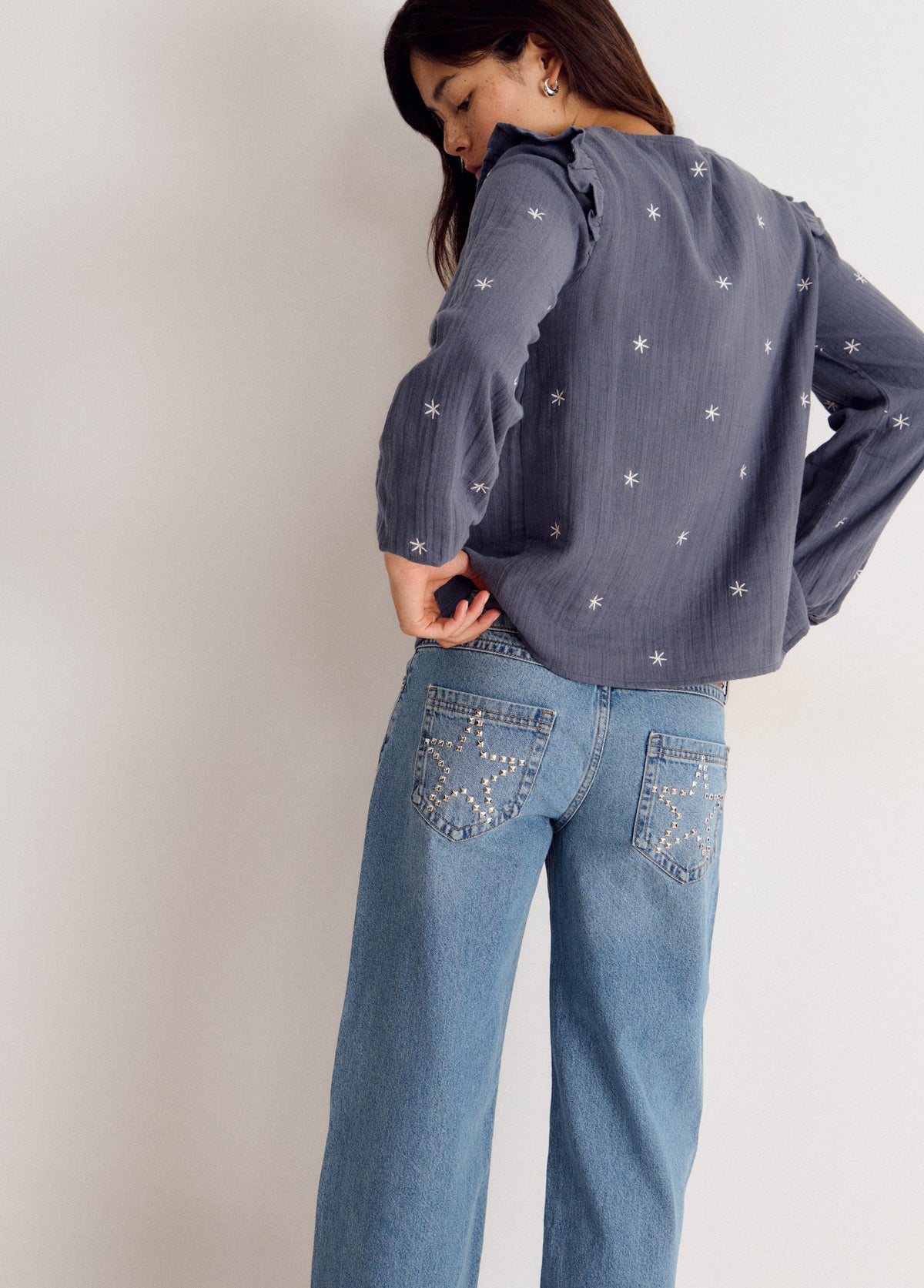 Blusa manga larga dobby escote pico