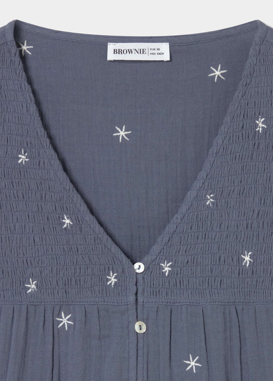 Blusa manga larga dobby escote pico