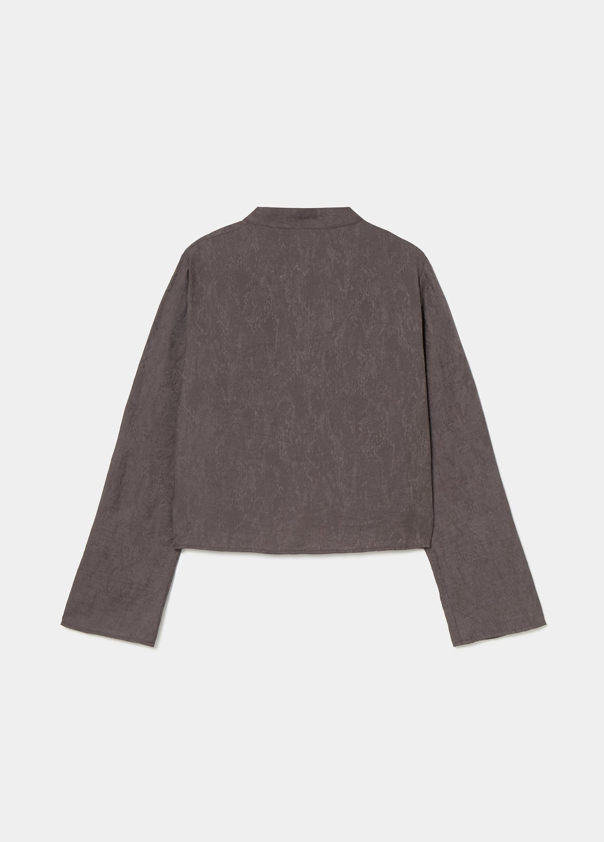 Blusa jacquard detalle lazos