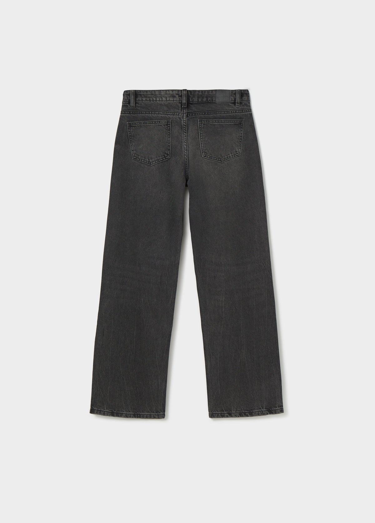 Jeans tiro bajo tachas flor