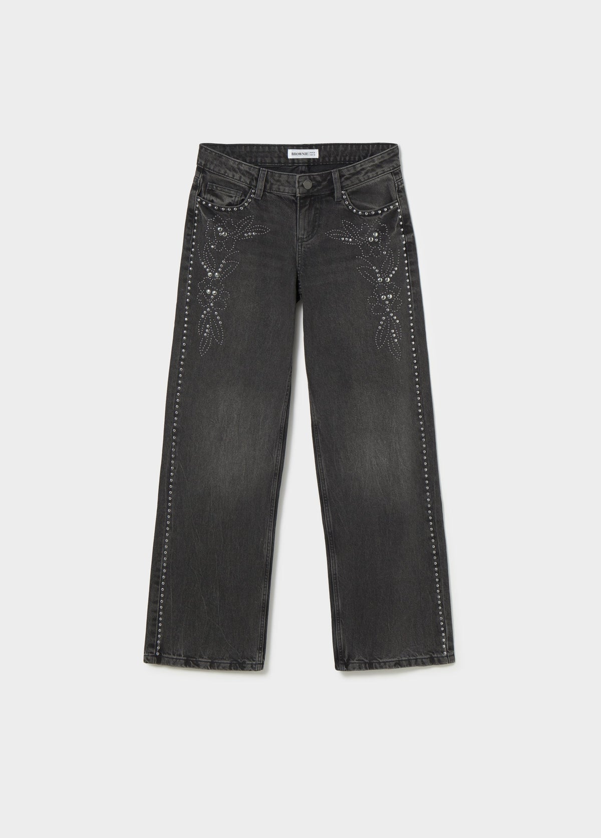 Jeans tiro bajo tachas flor
