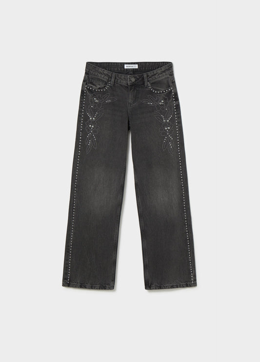 Jeans tiro bajo tachas flor