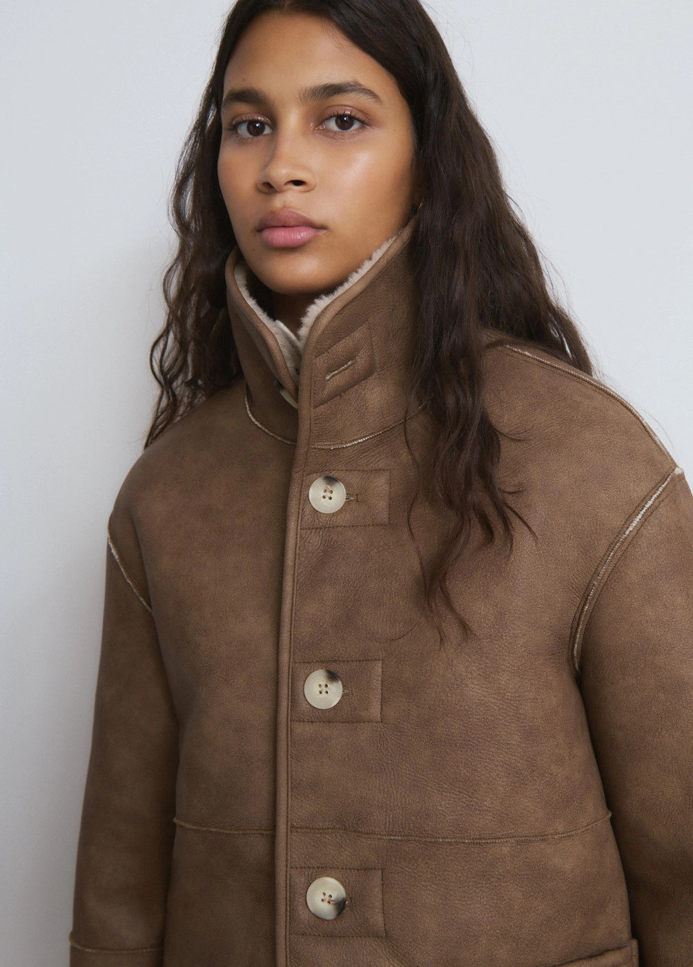 Abrigo doblefaz reversible efecto borrego