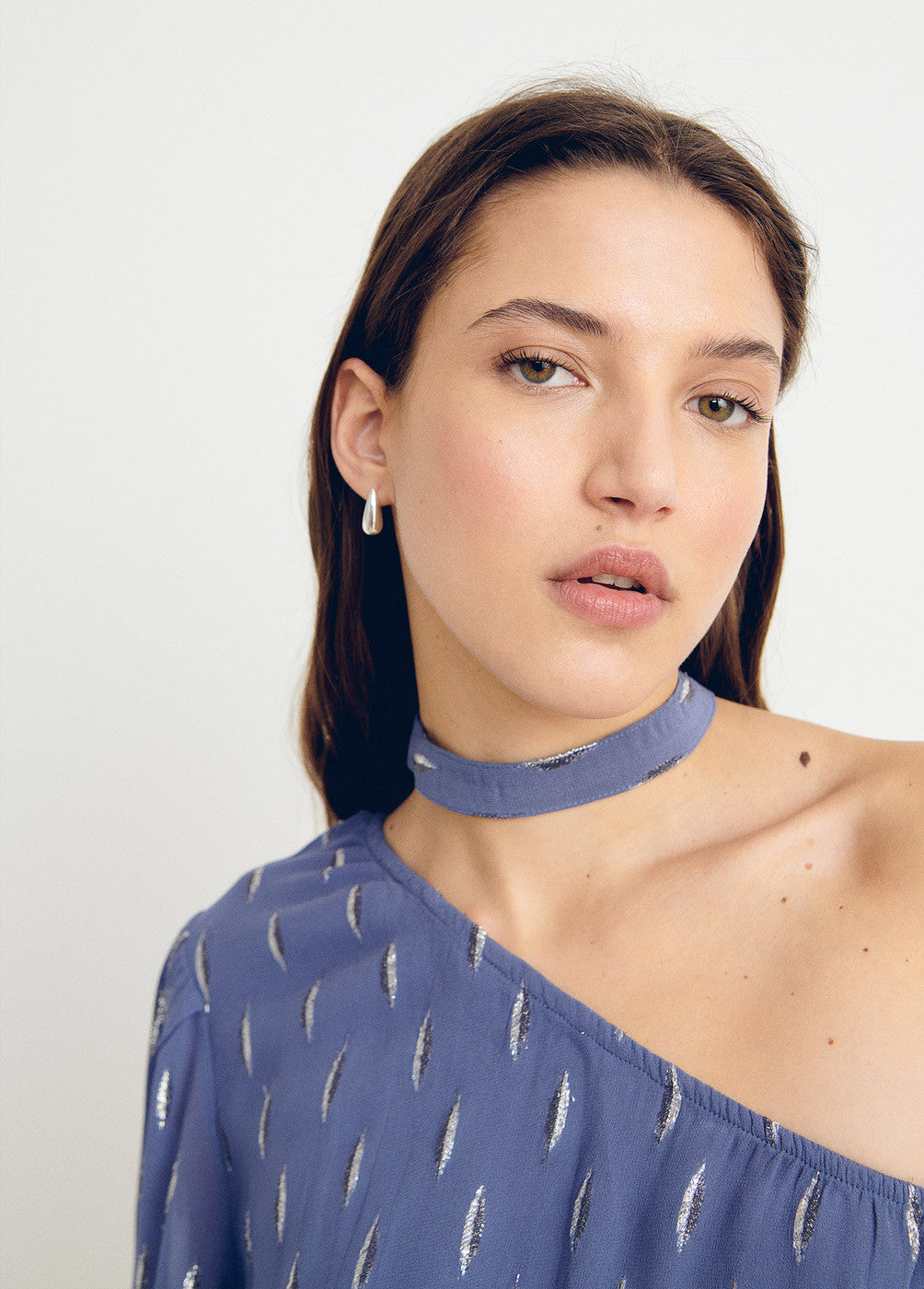 Blusa asimétrica brillo