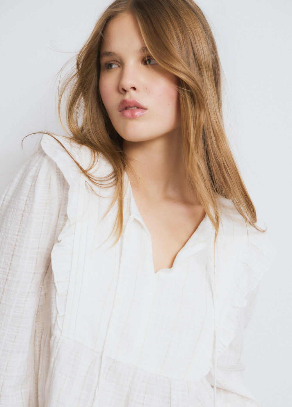 Blusa detalle volantes raya lurex