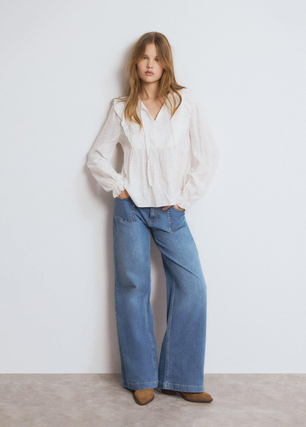 Blusa detalle volantes raya lurex