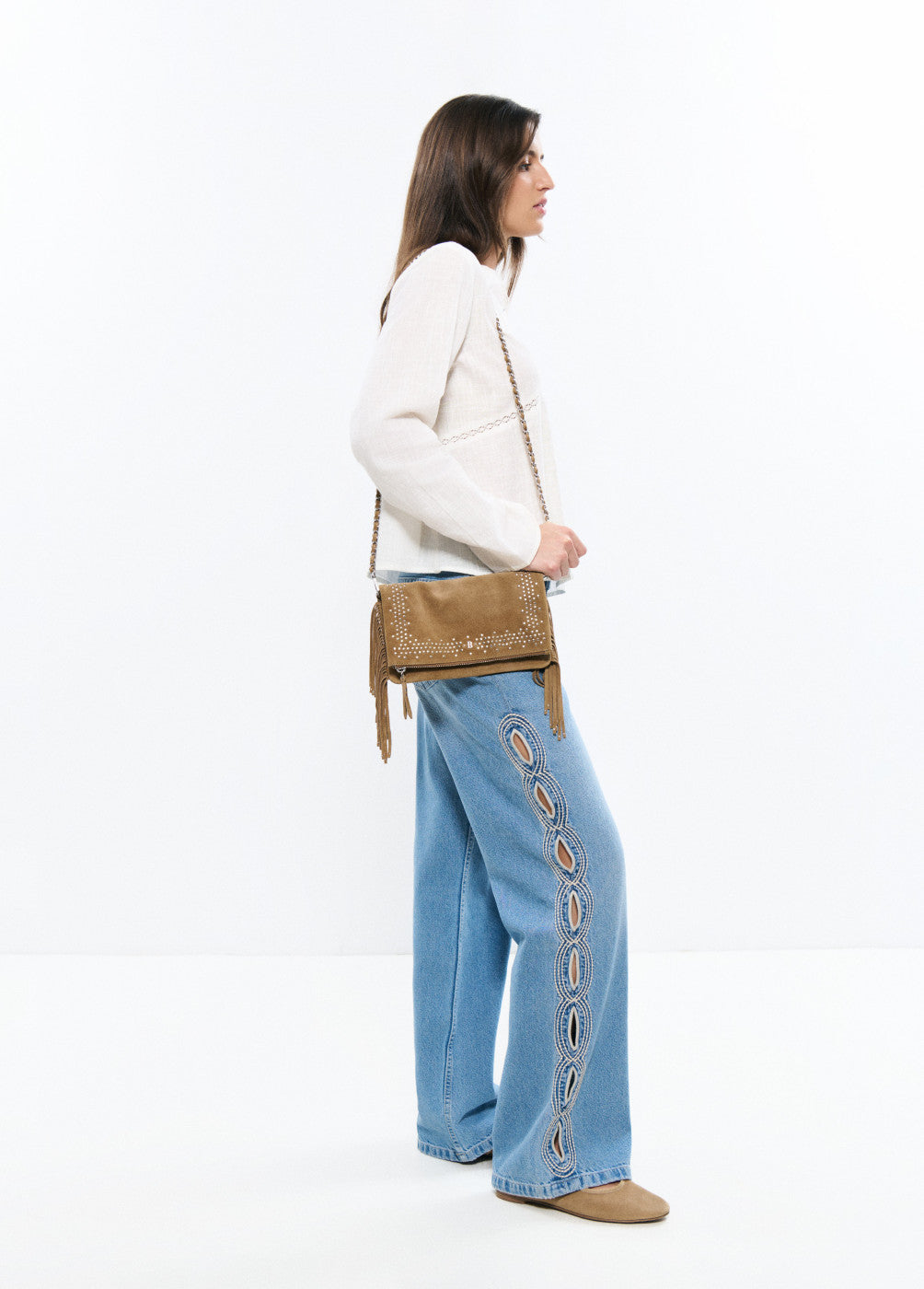 Bolso solapa tachitas flecos piel