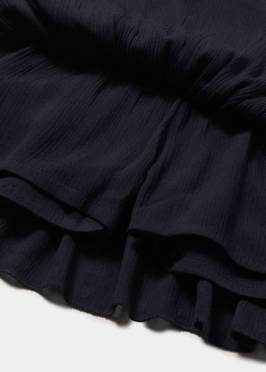 Falda volantes tachitas