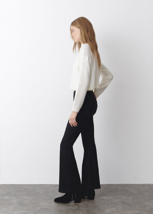 Jeans campana tachas