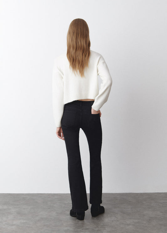 Jeans campana tachas