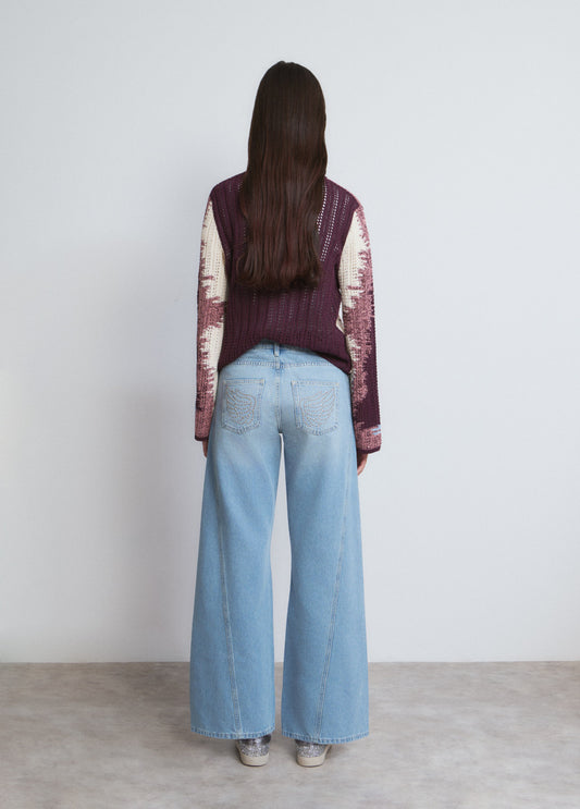 Jeans culotte pieza lateral alas bolsillo