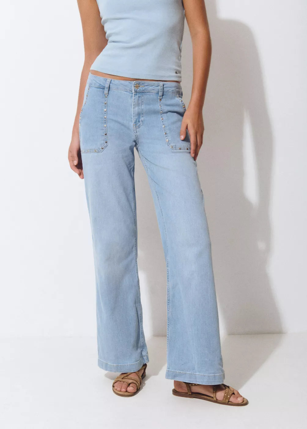 Jeans culotte tachas