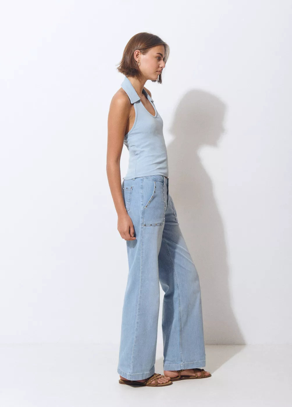 Jeans culotte tachas