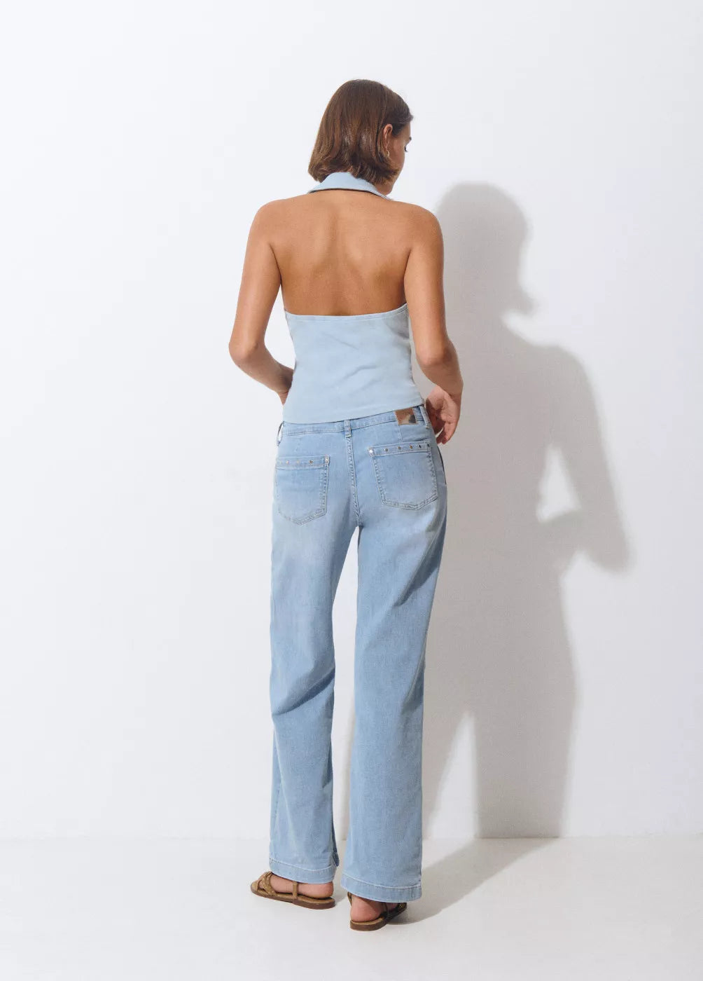 Jeans culotte tachas