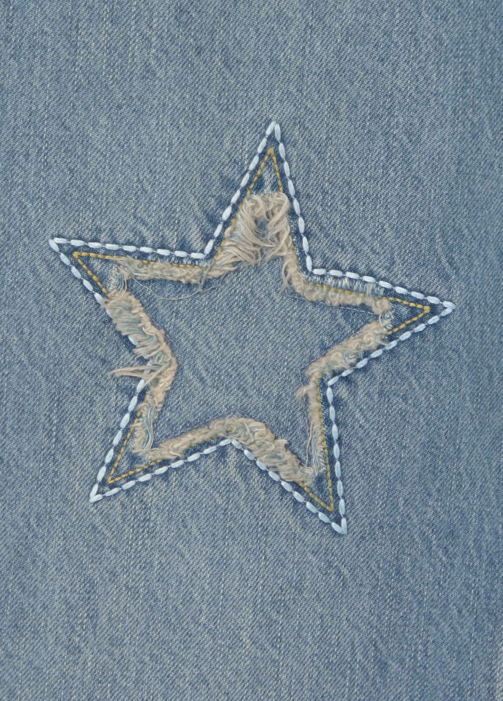 Jeans estrellas parche desflecado