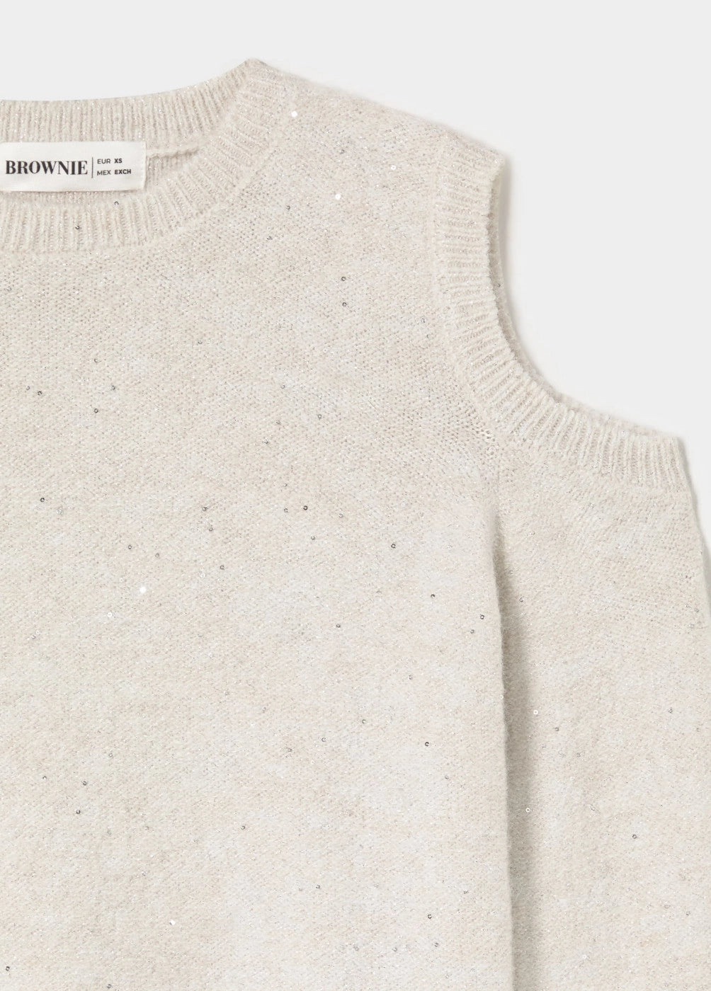 Jersey aperturas hombros lentejuelas