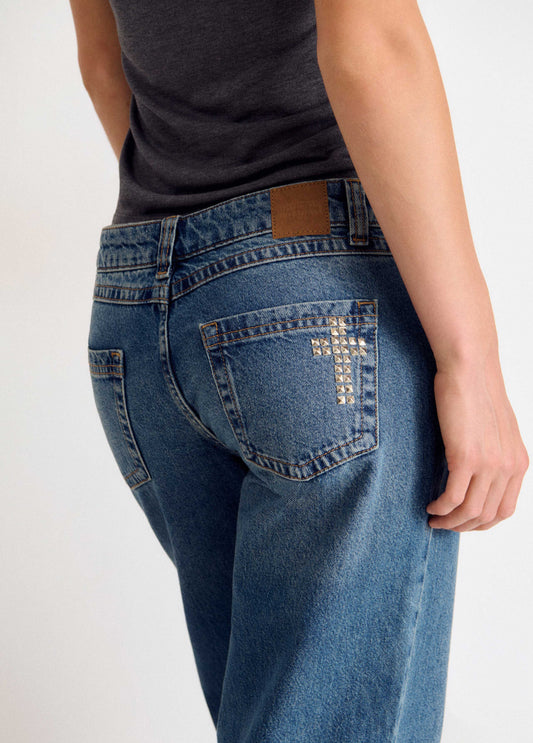 Jeans tachas cruz