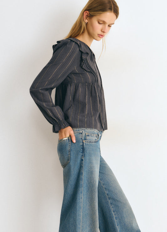 Blusa detalle volantes raya lurex
