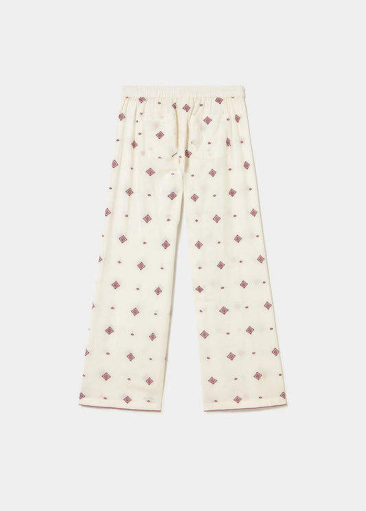 Pantalón largo bordado cenefa