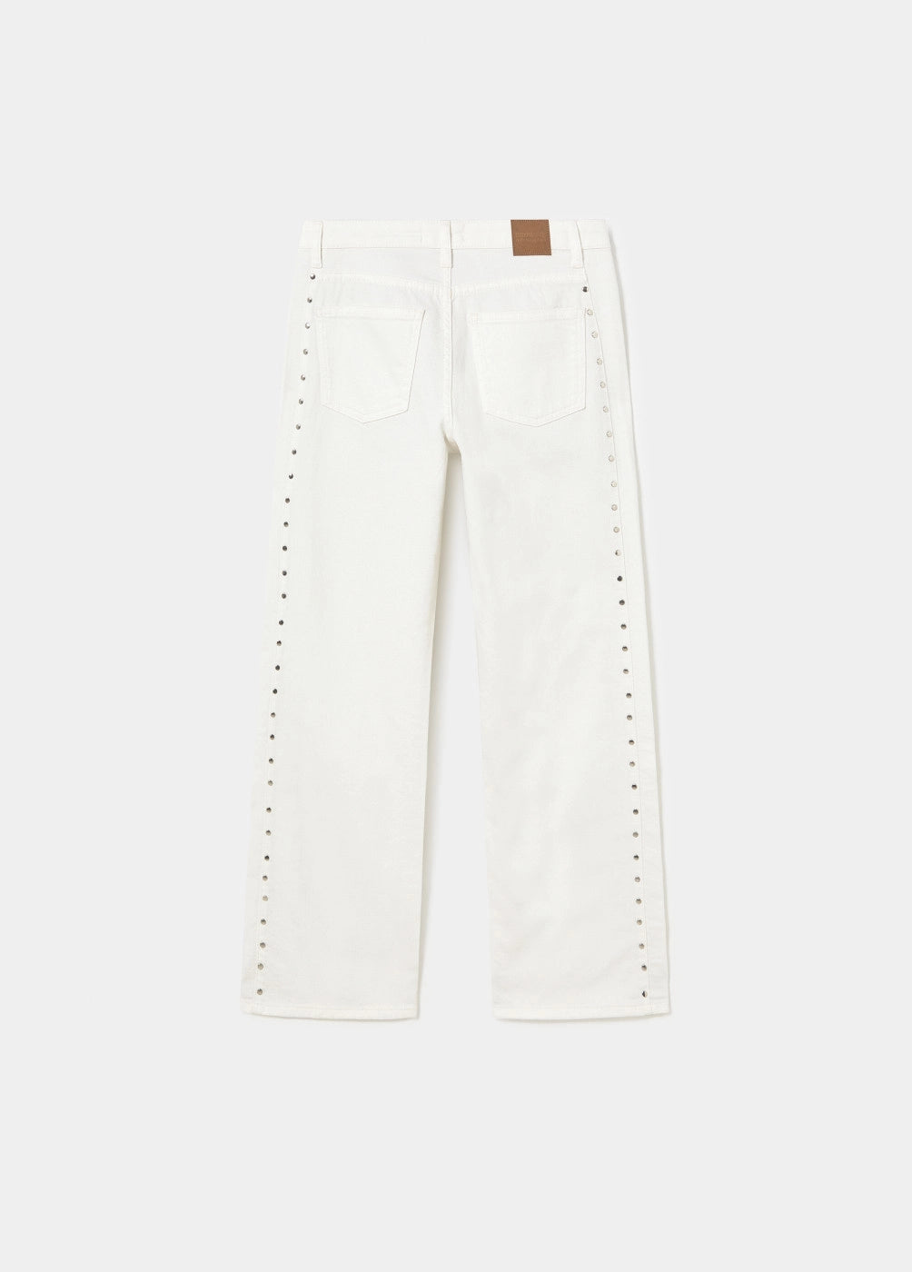 Pantalón pieza lateral tachuelas