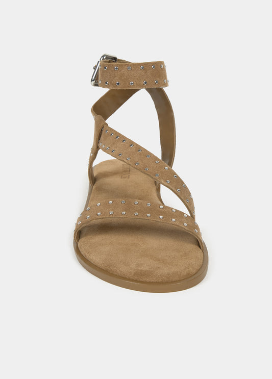 Sandalia plana tiras tachas cuero
