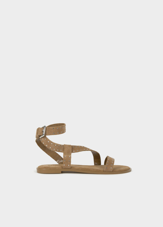 Sandalia plana tiras tachas cuero