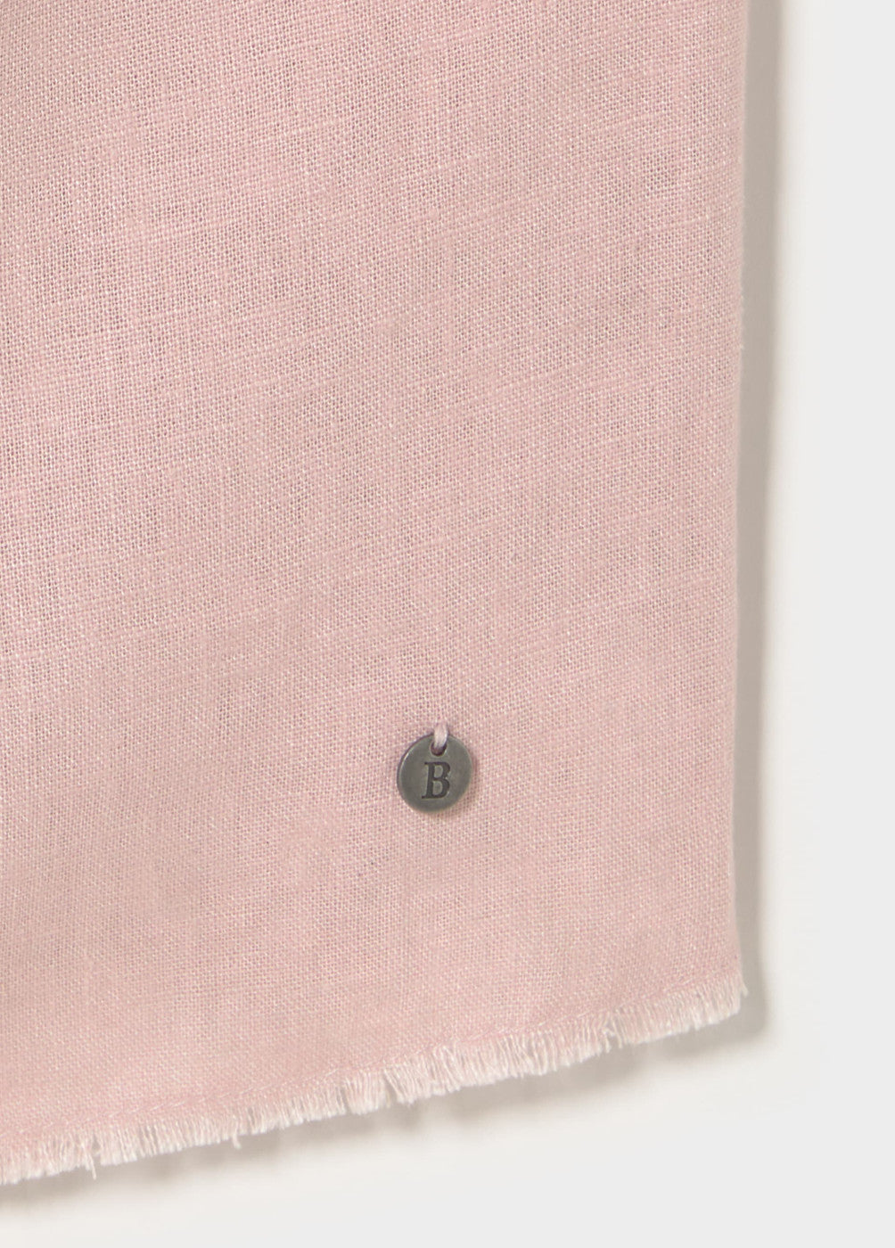 Top asimétrico volante